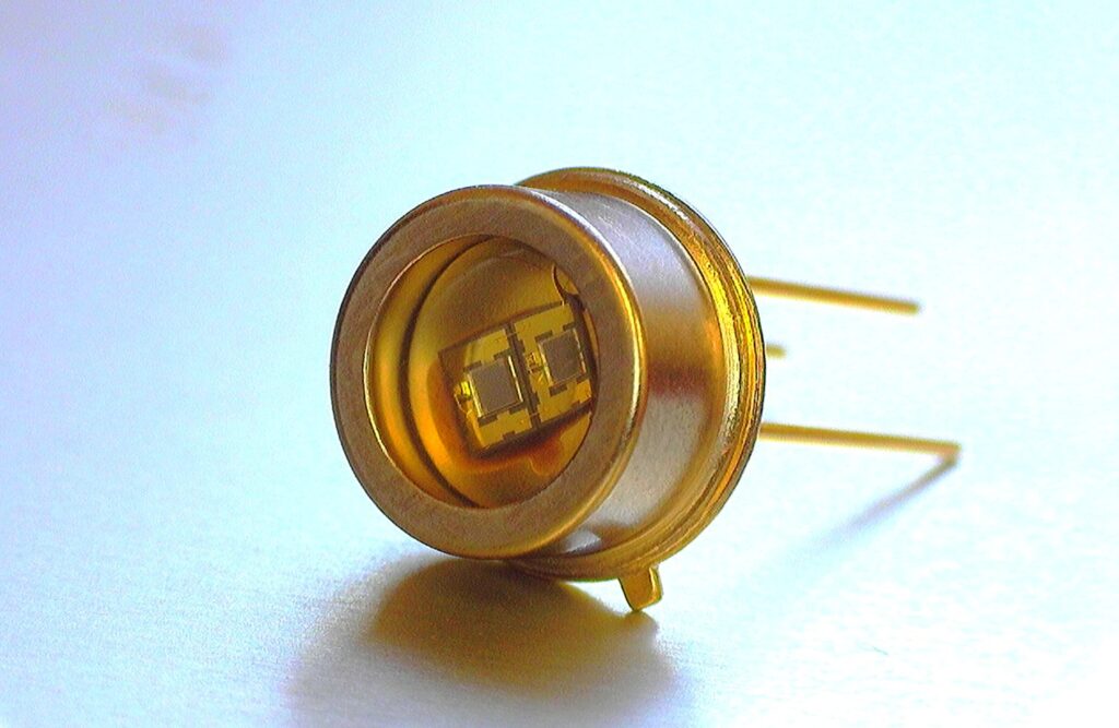 Image of two UVC chips in hermetic flat lens TO-can package